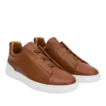derma contour couture, white leather sneakers designer, gold accent sneakers, minimalist luxury sneakers, handcrafted Italian sneakers,
