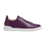 , traditional Italian methods, master artisan, luxury materials, ethically sourced leather, gold hardware, metallic accents